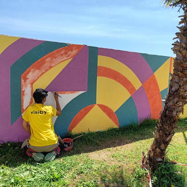 visiby diseño de espacio comercial realización de mural para tarraza del Francy Arena de Orte Scalo